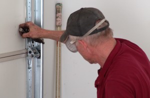 Vise grip vertical track above roller.