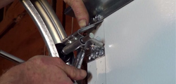 How to Adjust Garage Door Top Fixtures