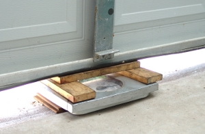 Weighing a garage door